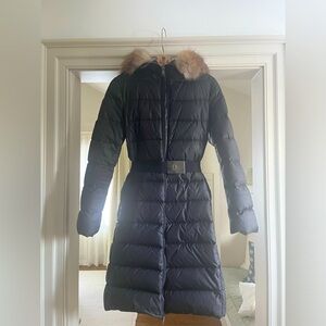 Moncler knee length puffy jacket with fur hood and removable logo belt